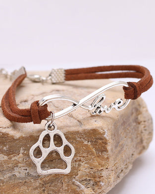 Armband med hundtassformat hängande