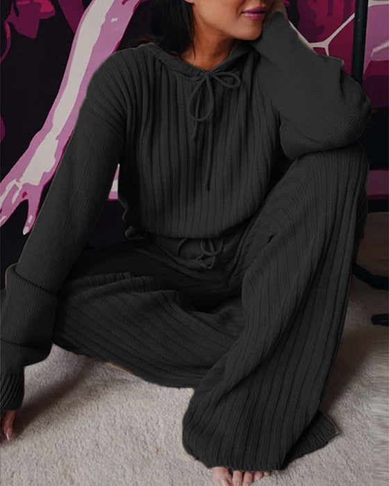 Lös långärmad kostym med huva