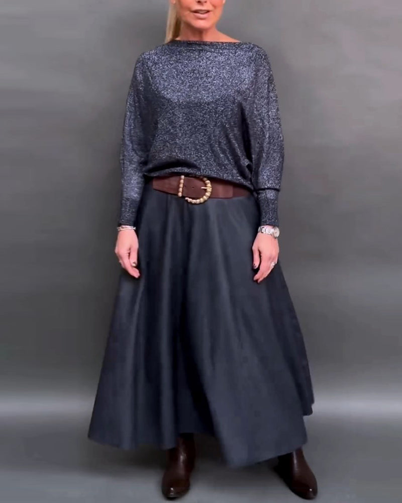 Glänsande topp med rund hals och dolmanärm