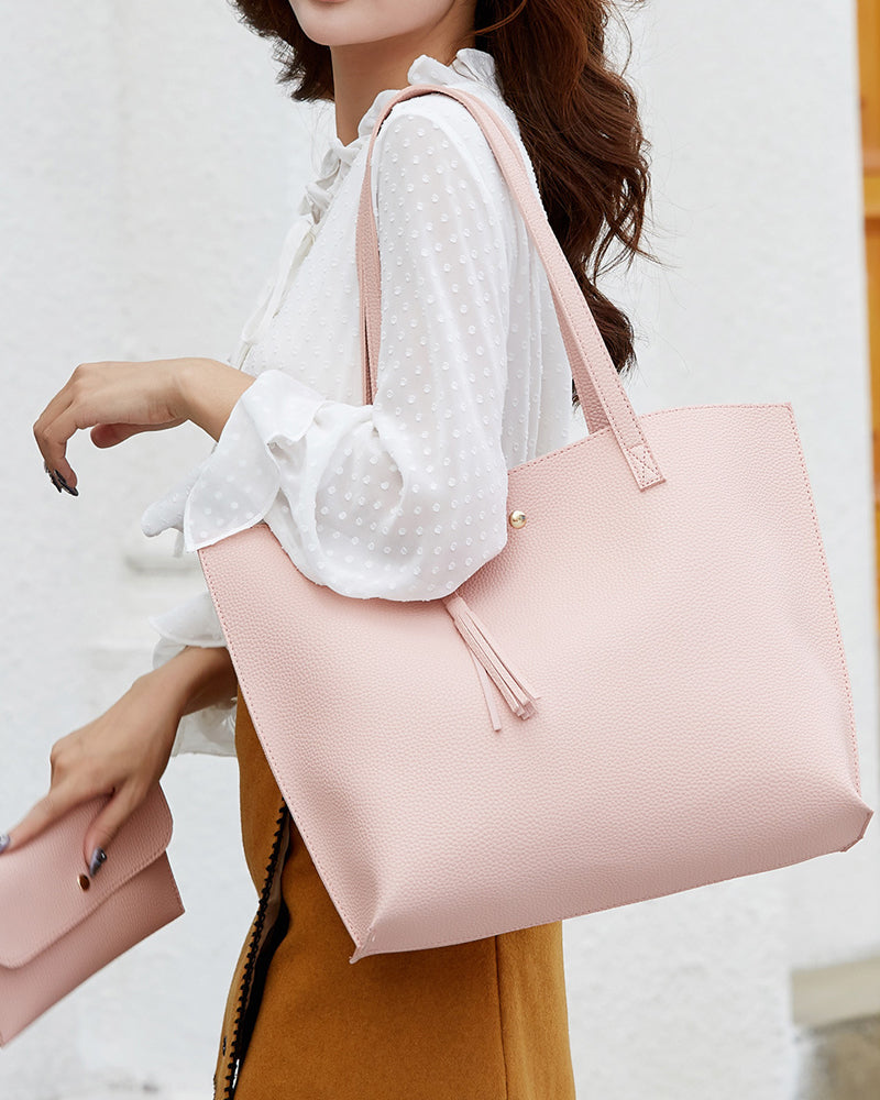 Kapacitet med enfärgad tofs axelväska med stor