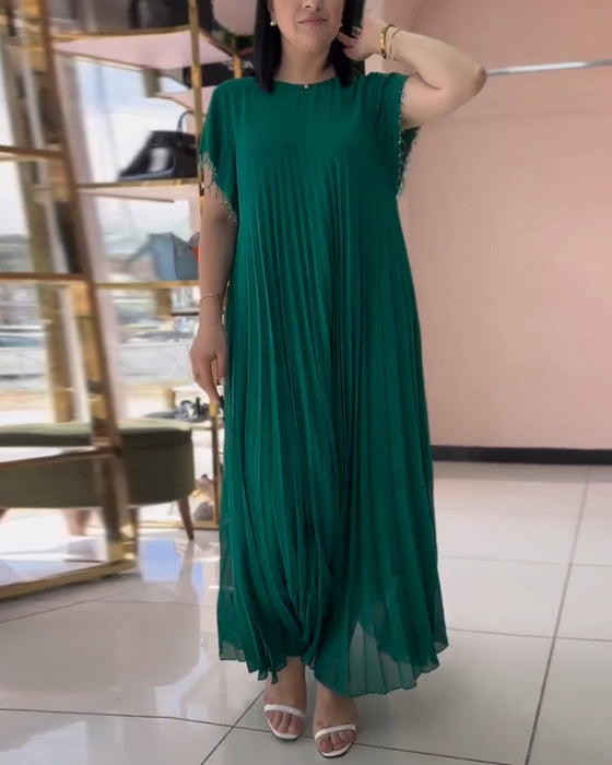 Klänning med kort ärm och veckad