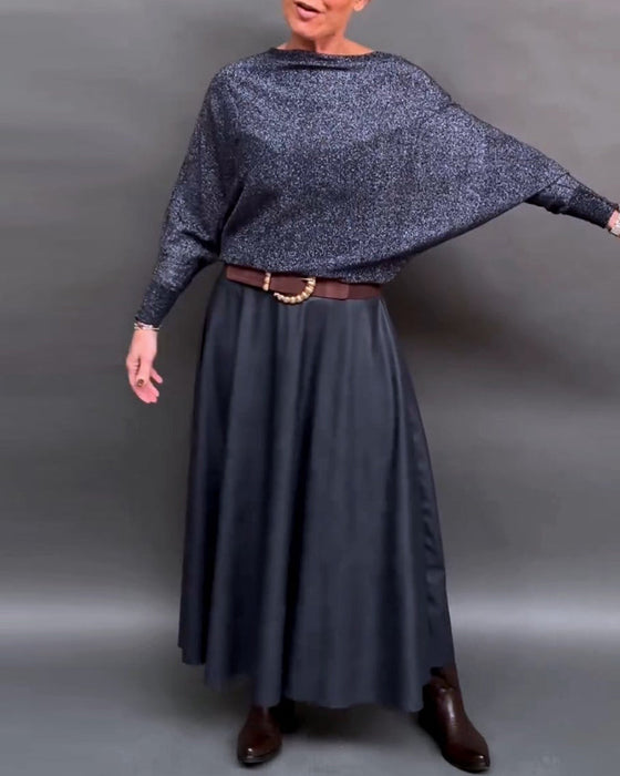 Glänsande topp med rund hals och dolmanärm