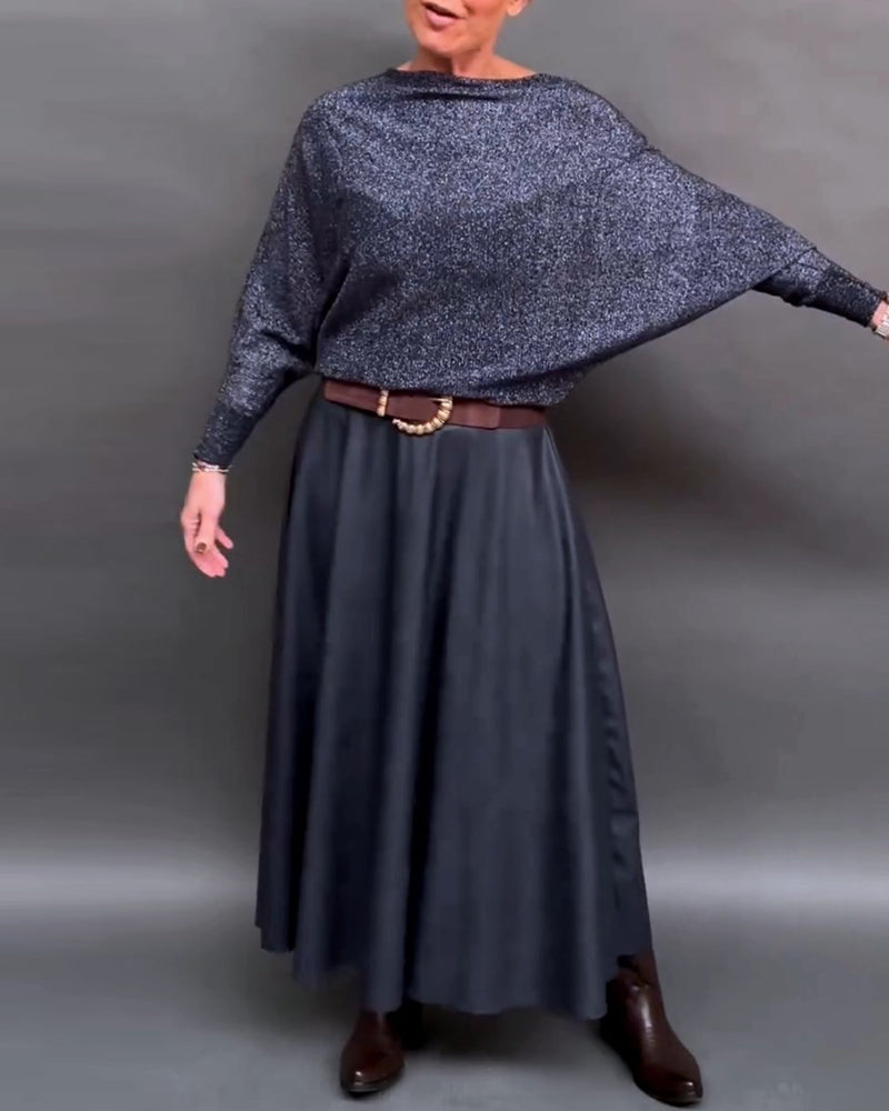 Glänsande topp med rund hals och dolmanärm