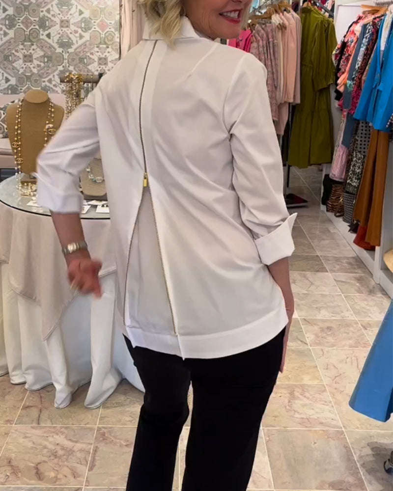 Enfärgad blus med dragkedja