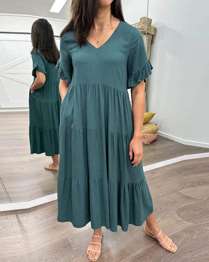 Klänning med lösa ärmar och paneler