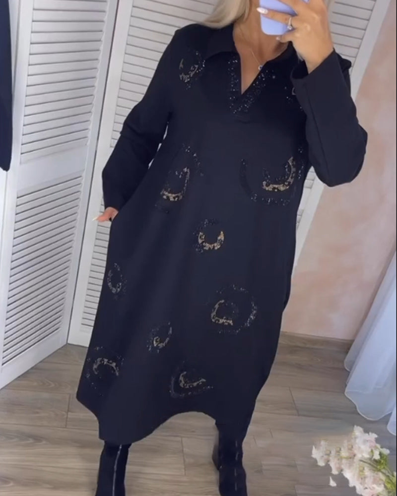 Långärmad midiklänning med slag