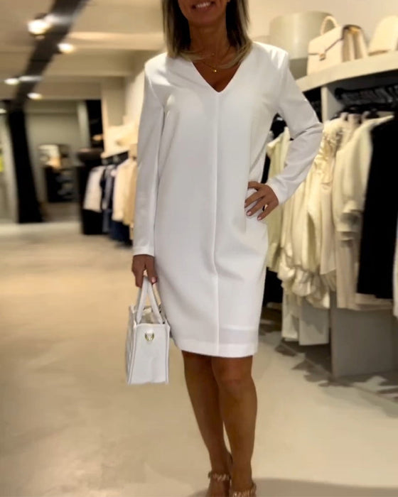 Knälång skiftklänning med långa ärmar