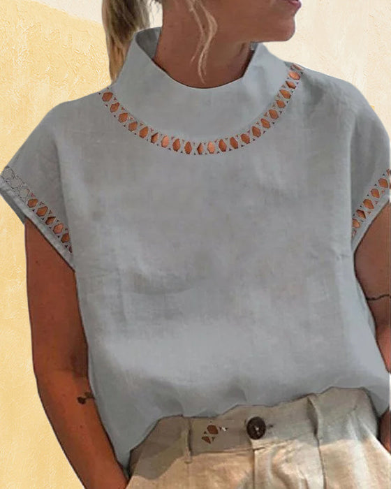 Enfärgad skjorta med spetsstativ krage