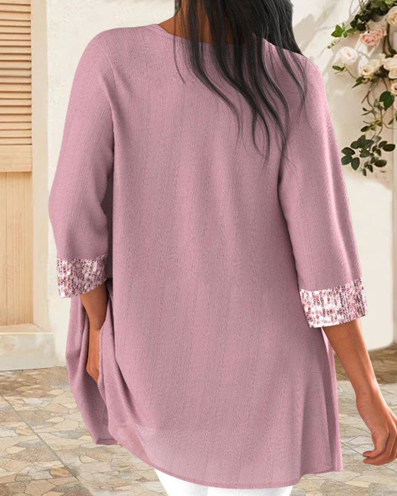 Linnekofta med paljetter