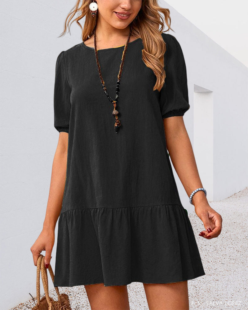 Klänning i bomullslinne med puffärmar