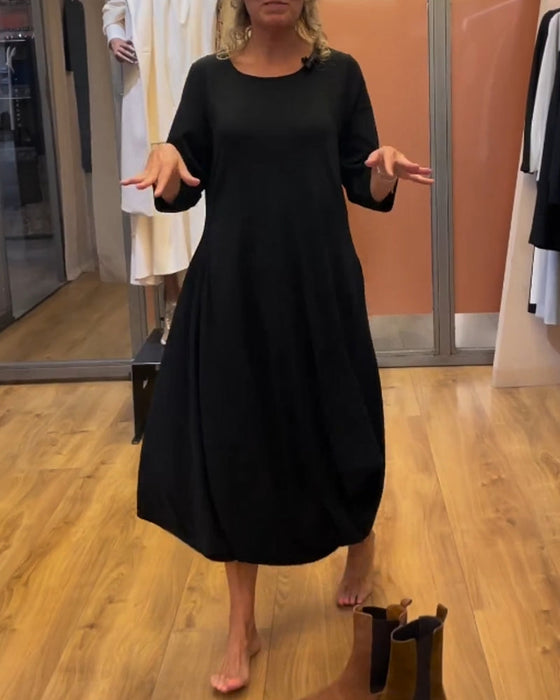 Klänning med långa ärmar och rund hals