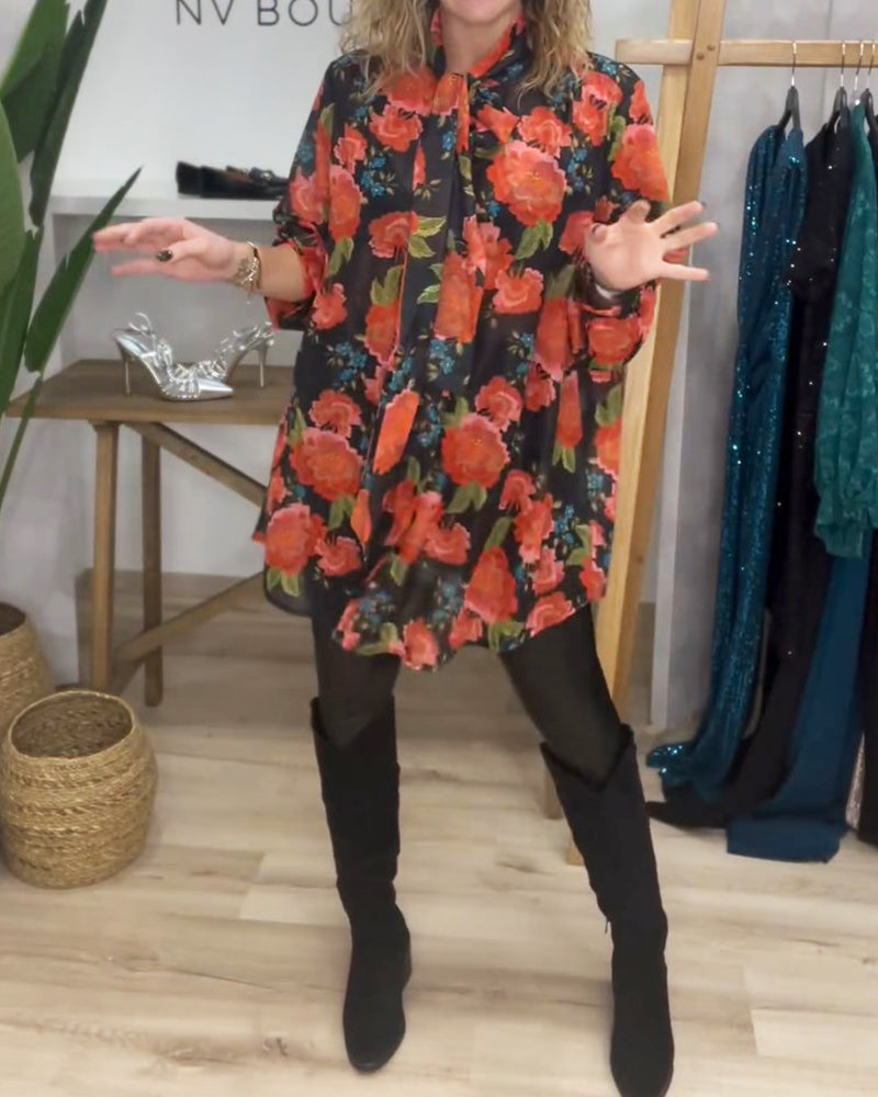 Blus med blommönster och lös passform