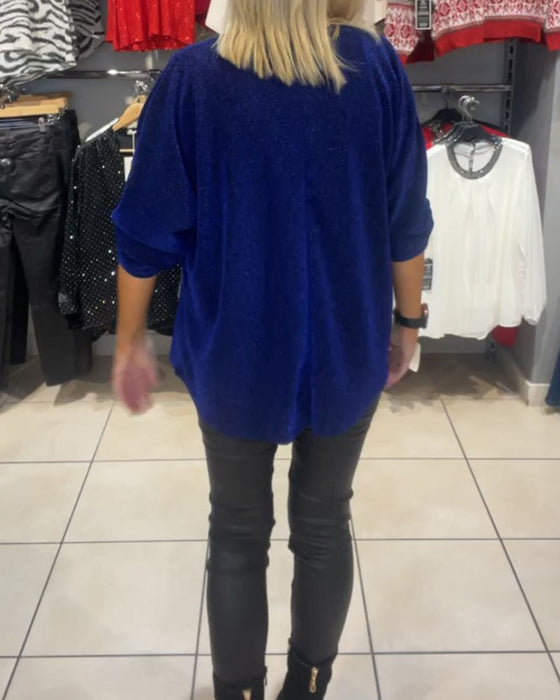 Löst topp med långa ärmar och dragkedja