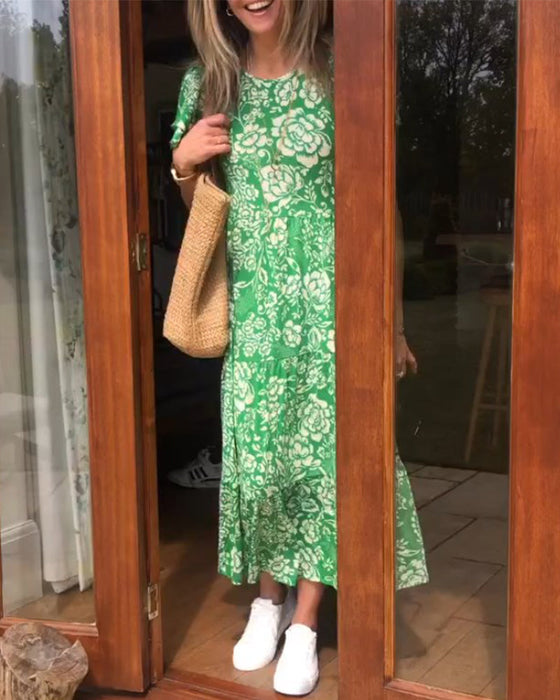 Kortärmad långklänning med blommönster