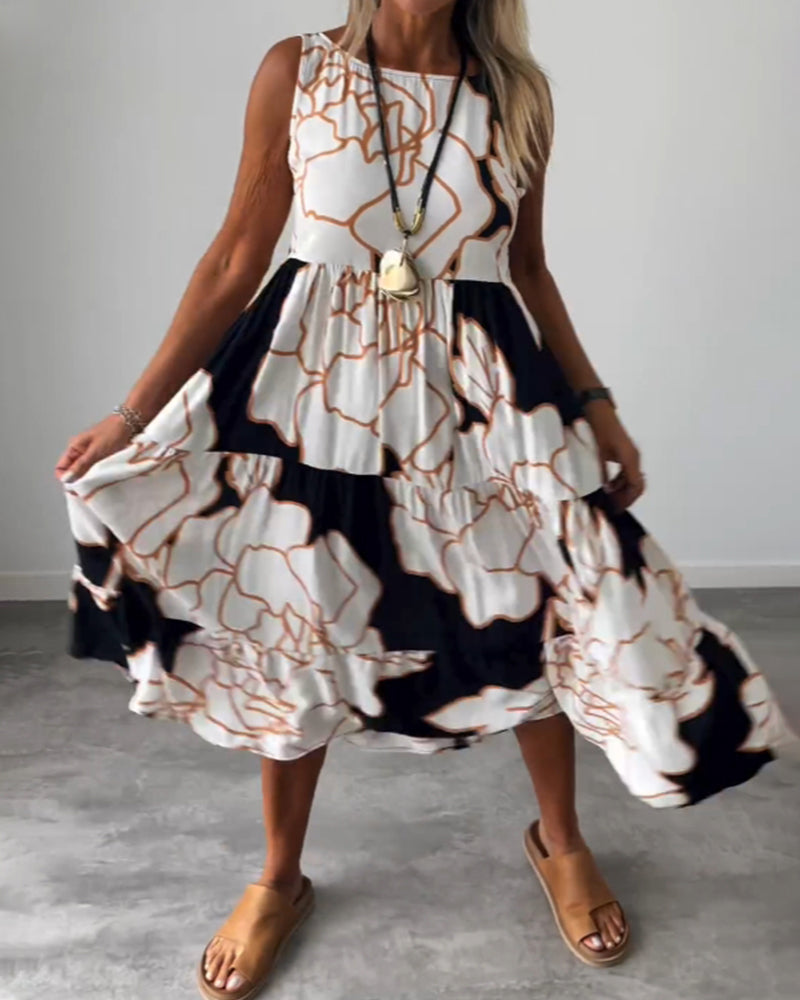 Klänning med ärmar och blommönster