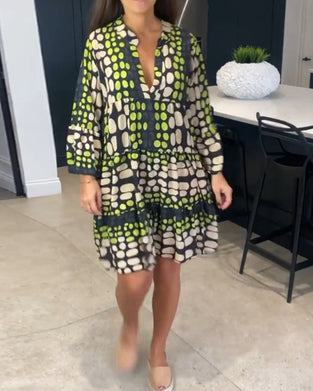 Fritidsklänning med djup v-tryck