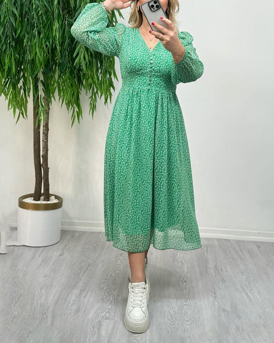 Elegant klänning med tryck