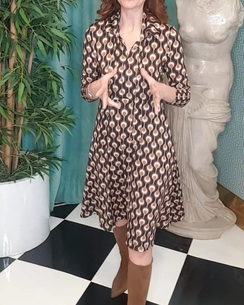 Elegant 3/4-ärmad klänning med tryck