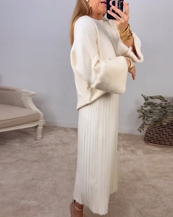 Elegant enfärgad pullover med långa ärmar