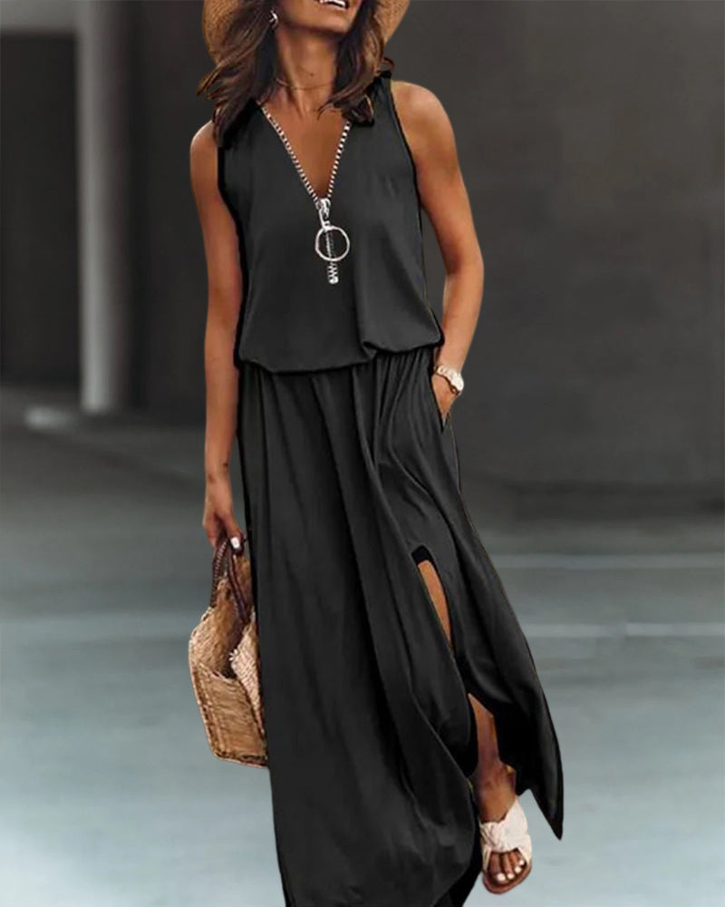 Enfärgad klänning med dragkedja och slits