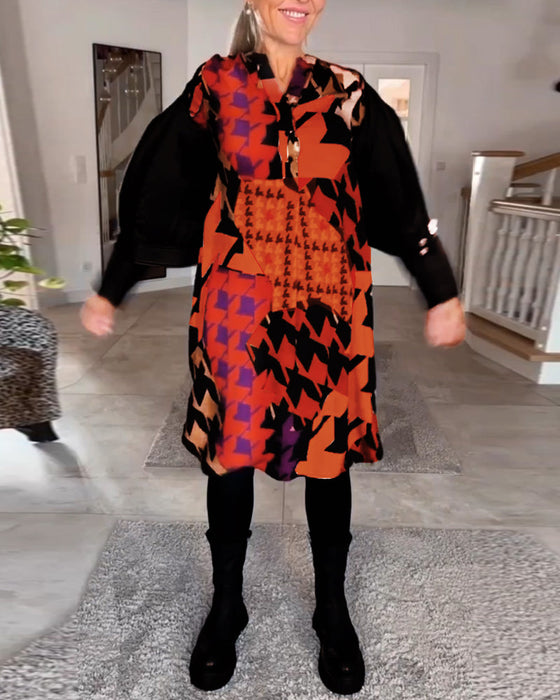 Klänning med v-ringning och långa ärmar