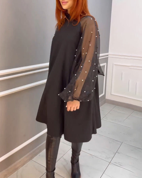 Mesh lös klänning med hög hals