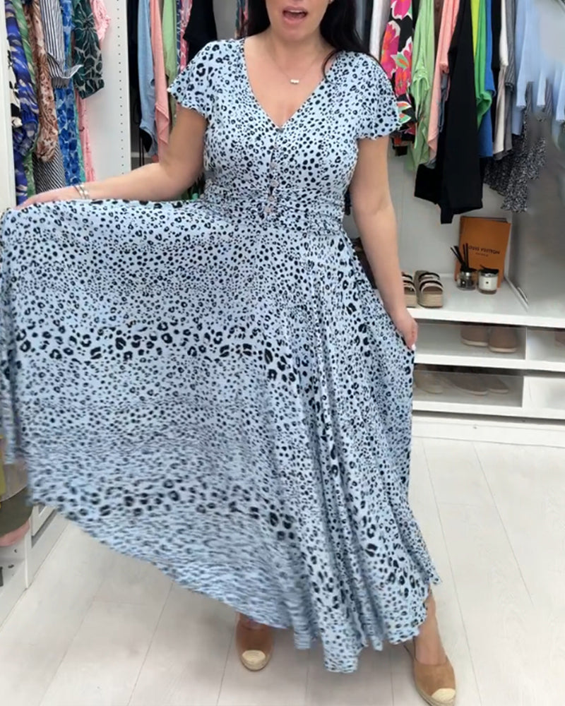 Kortärmad klänning med V-ringning