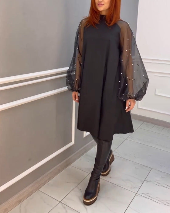 Mesh lös klänning med hög hals