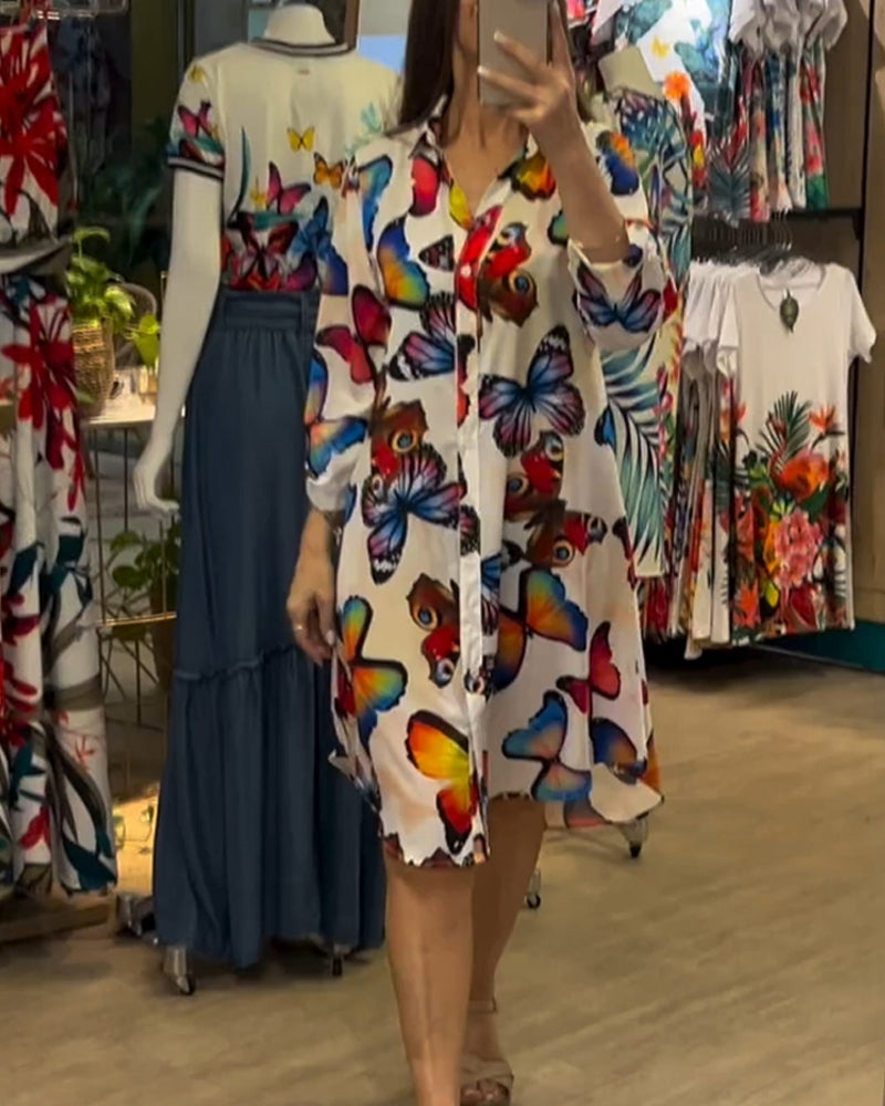 Klänning med fjärilstryck och lös passform