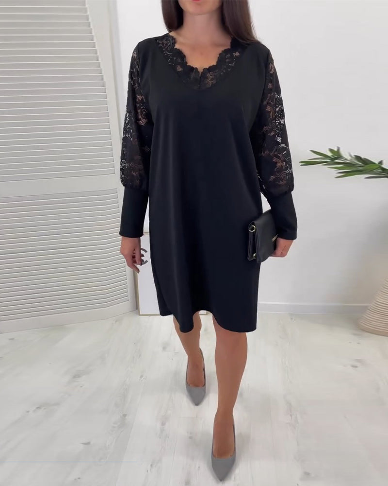 Elegant klänning med v-ringning och spets