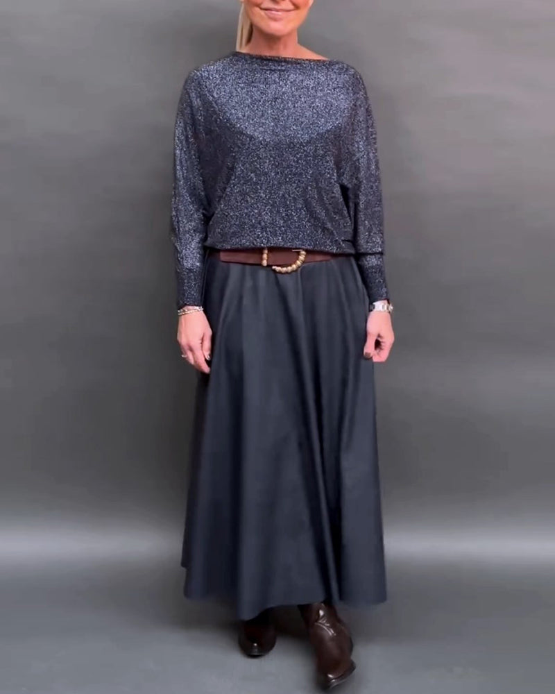 Glänsande topp med rund hals och dolmanärm