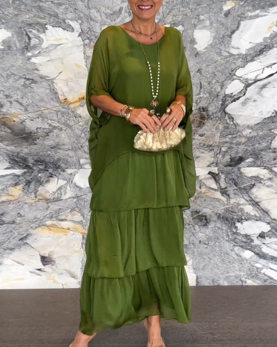 Klänning med konstnärlig stil och lös passform