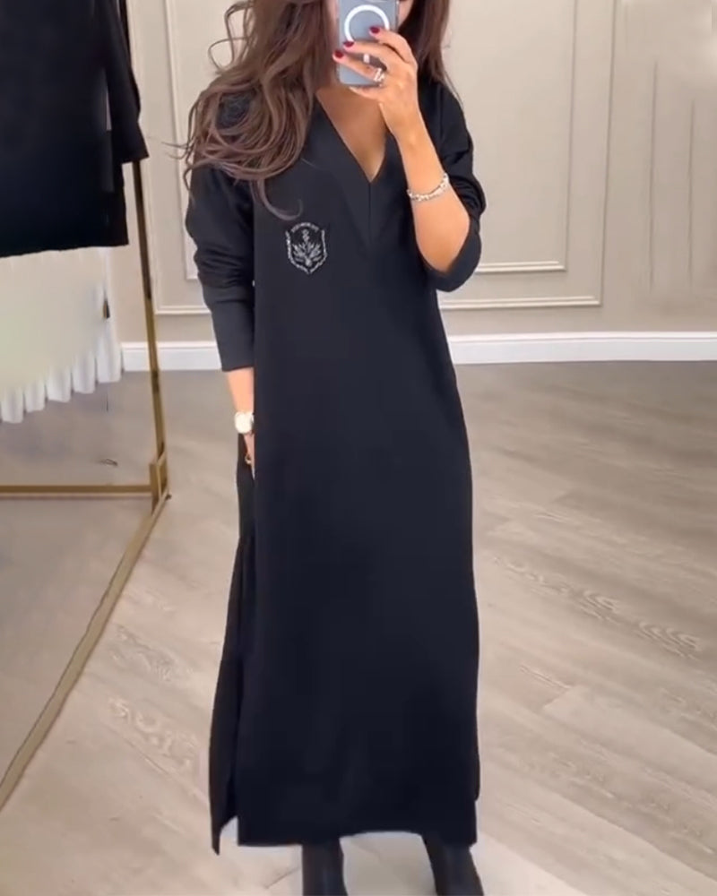 Elegant klänning med v-ringad sidosprund