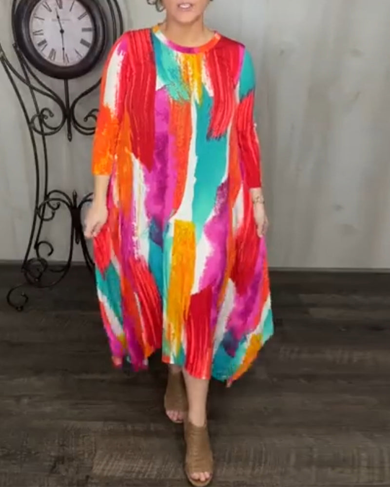 Färgglad, rund halsad ledig klänning med tryck