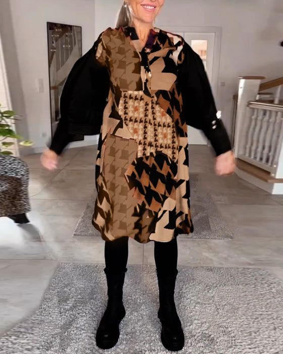 Klänning med v-ringning och långa ärmar