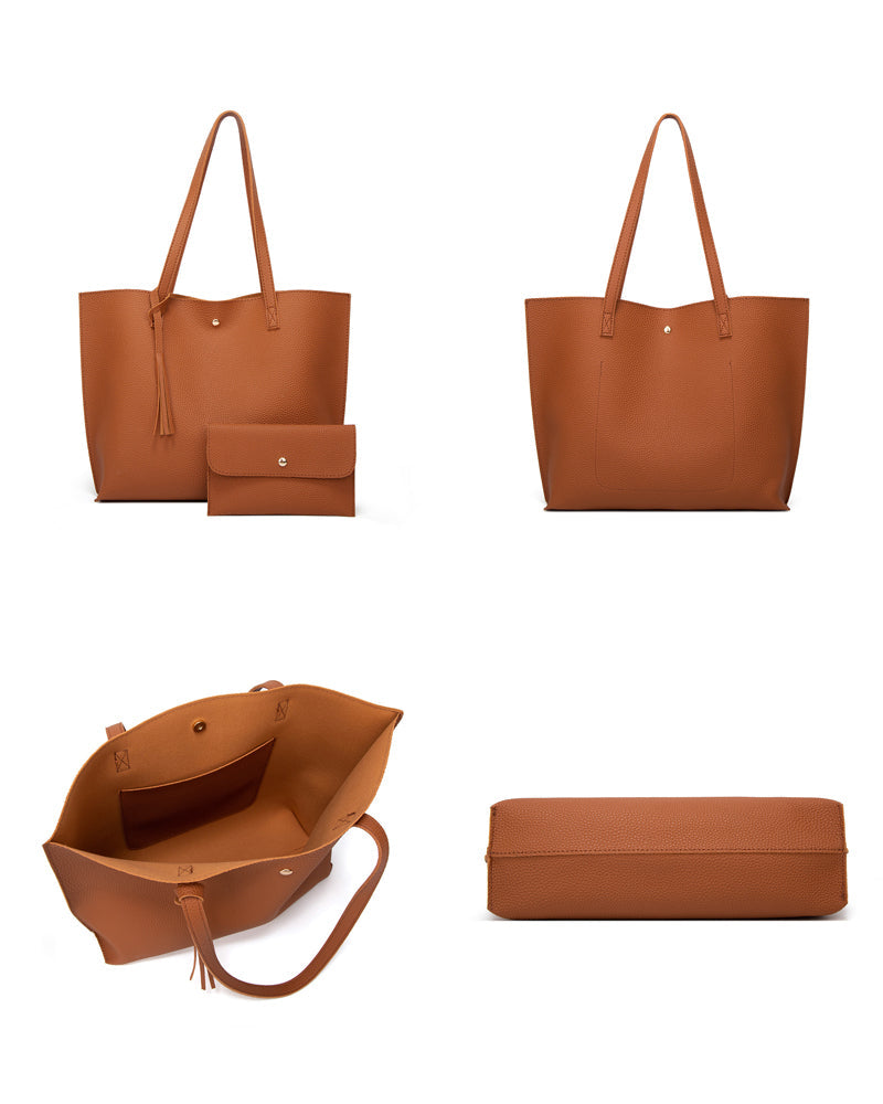 Kapacitet med enfärgad tofs axelväska med stor