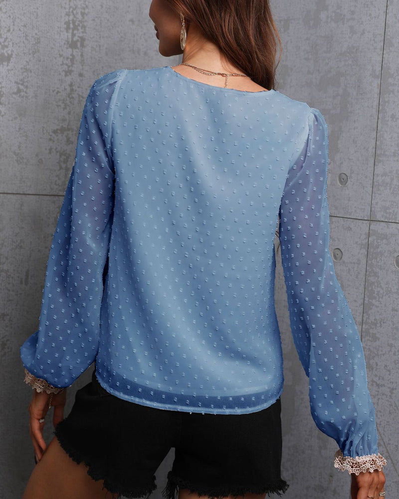 Enfärgad långärmad blusar med spets