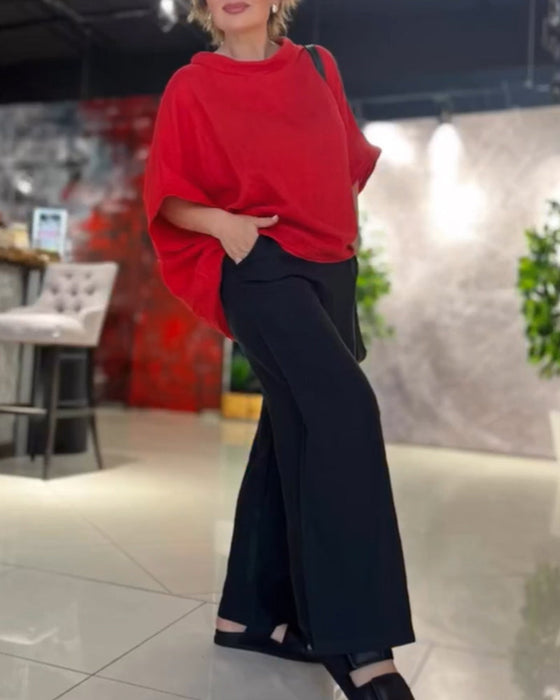 Enfärgad topp med hög halsringning