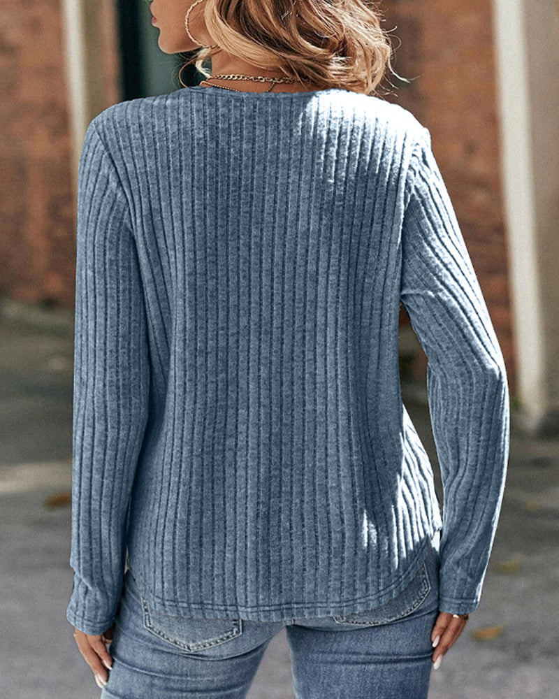 Långärmad spets i panel med rund hals