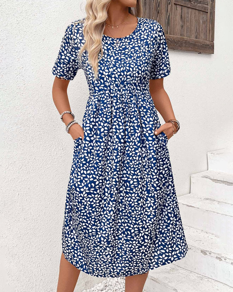 Klänning med rund hals och pendlarstil