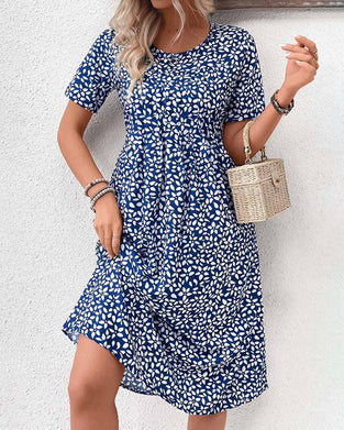 Klänning med rund hals och pendlarstil