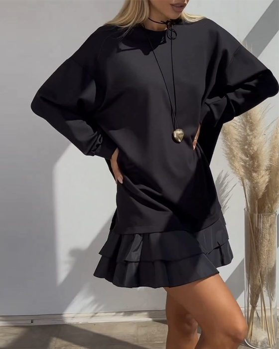 Löst enfärgad klänning med patchwork