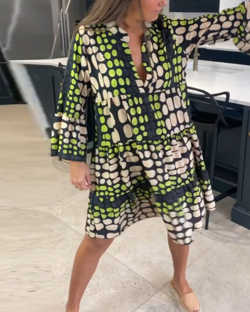 Fritidsklänning med djup v-tryck