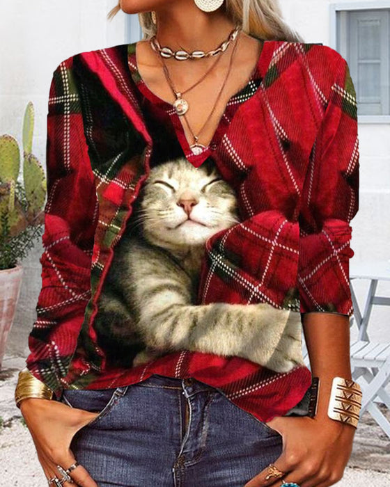 Topp med kattpaneler och långa ärmar