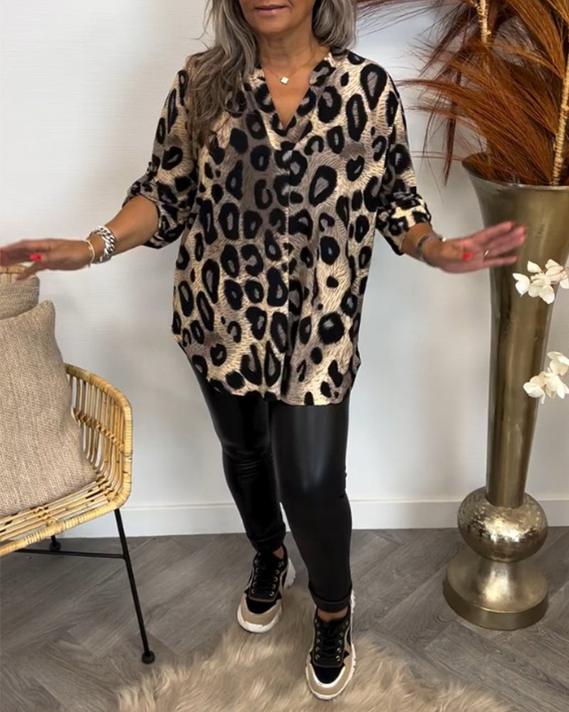 Långärmad topp med leopardtryck