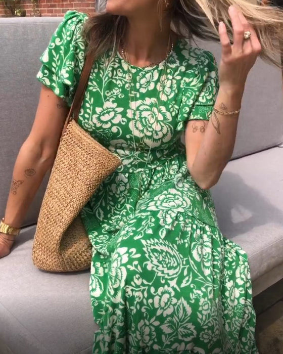 Kortärmad långklänning med blommönster