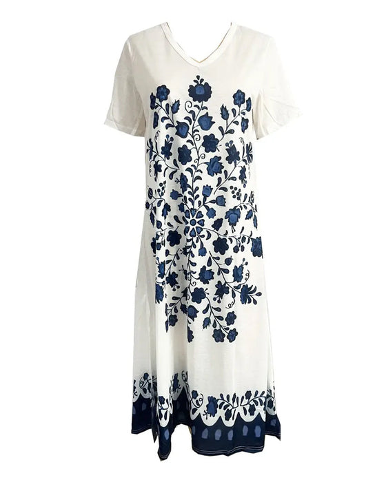 Klänning med korta ärmar och tryck och slits