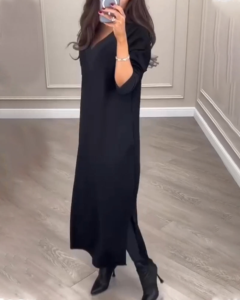 Elegant klänning med v-ringad sidosprund