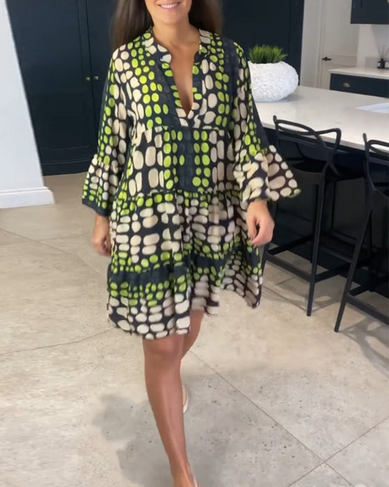 Fritidsklänning med djup v-tryck