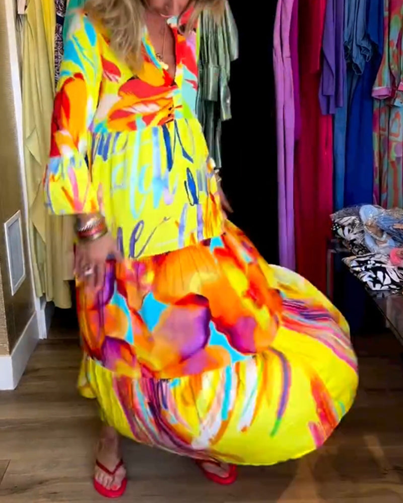 Klänning med utsvängd ärm och tryck